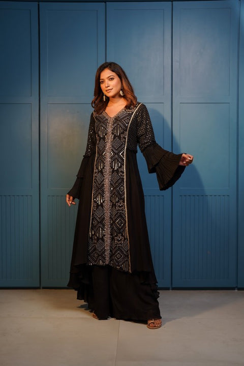 Black textured fabric and crepe flared A line kurta with pallazo set.