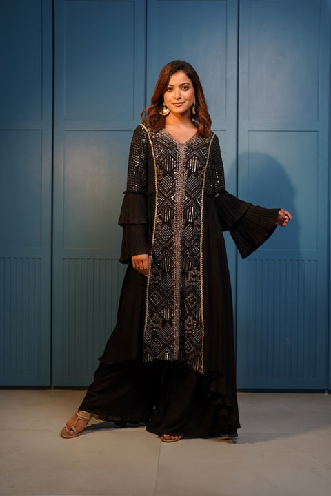 Black textured fabric and crepe flared A line kurta with pallazo set.