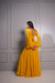 Mustard yellow double layered draped skirt with matching crop top.