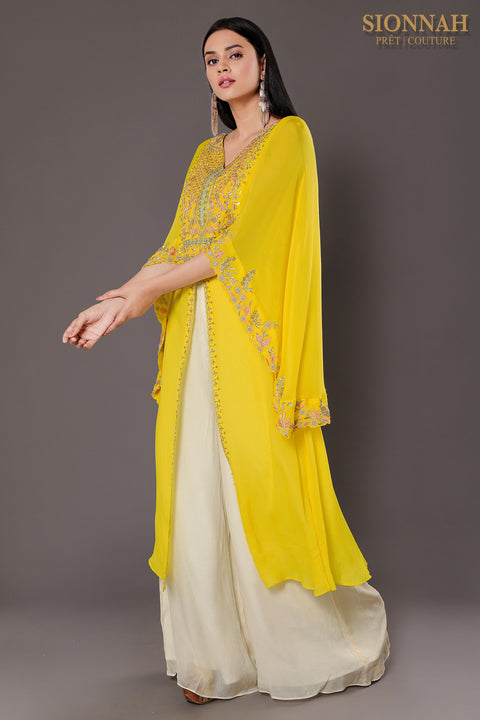 Bright yellow cape style front slit kurta with pallazo.