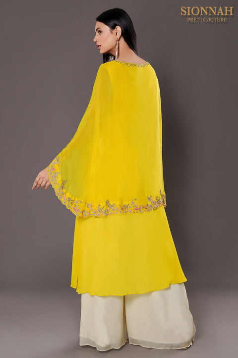 Bright yellow cape style front slit kurta with pallazo.