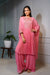 Pink kaftan style tunic set.