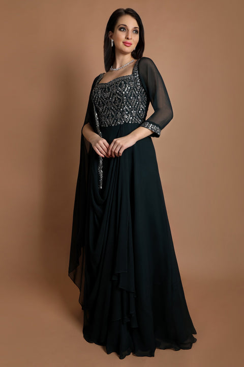 Bottle green draped dupatta style gown.