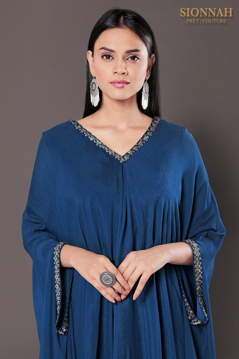 Deep teal Cape style flared tunic with dhoti pants.