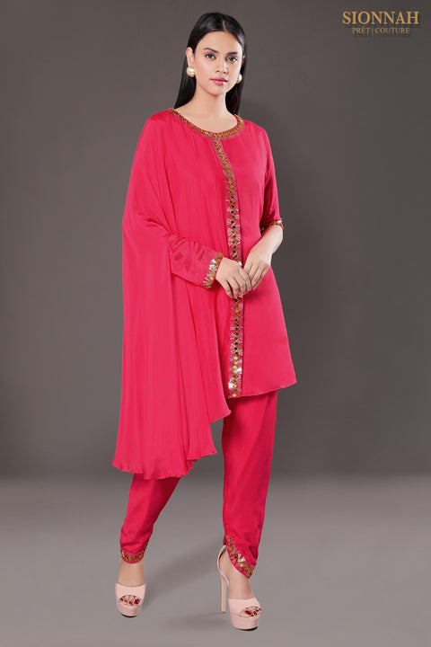 Hot pink one side flared tunic with tulip pants.