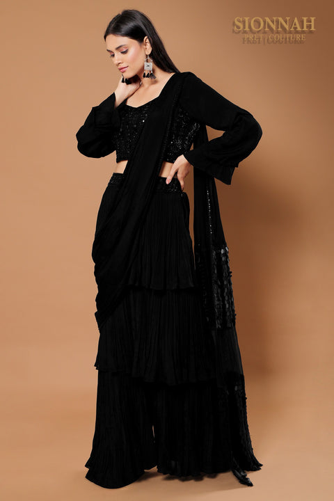 Black draped ruffle saree.