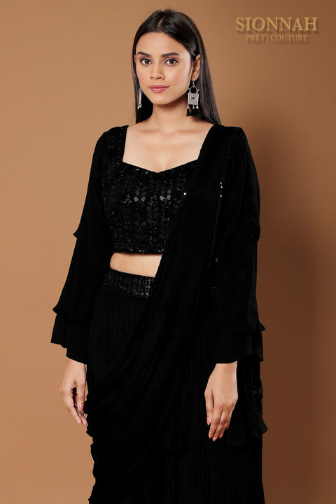 Black draped ruffle saree.