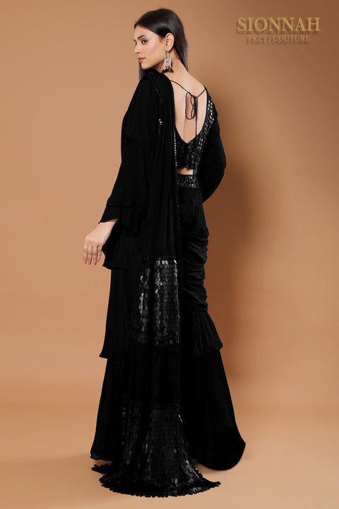 Black draped ruffle saree.