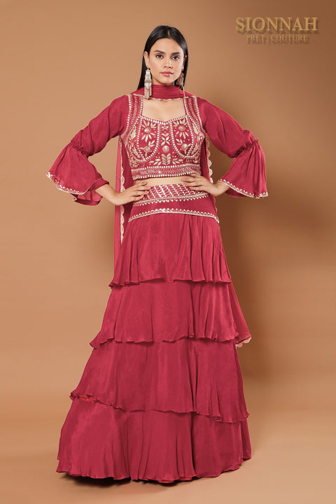 Maroon multi layered skirt set.