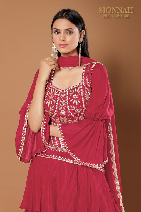 Maroon multi layered skirt set.