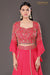 Coral pink layered skirt with accessory and crop top and skirt and dupatta.